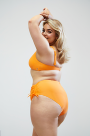Stylish Orange High-Waisted Bikini Bottoms with Adjustable Ruching Design